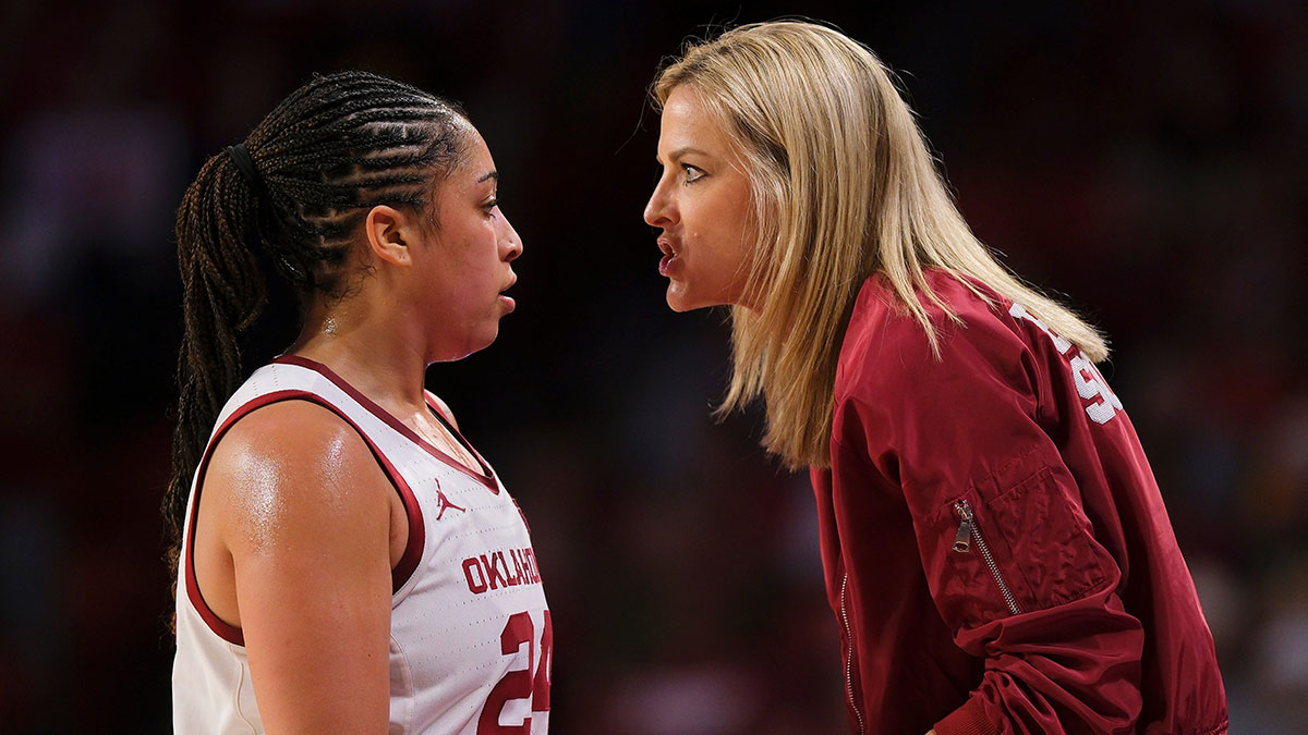 Sooner coach Jennie Baranczyk talks with Oklahoma Sooners forward Skylar Vann (24) as she comes off the court during the second round of the NCAA March Madness Women's college basketball game between University of Oklahoma Sooners and Iowa Hawkeyes at the Lloyd Noble Center in Norman, Okla., Monday, March 24, 2025.