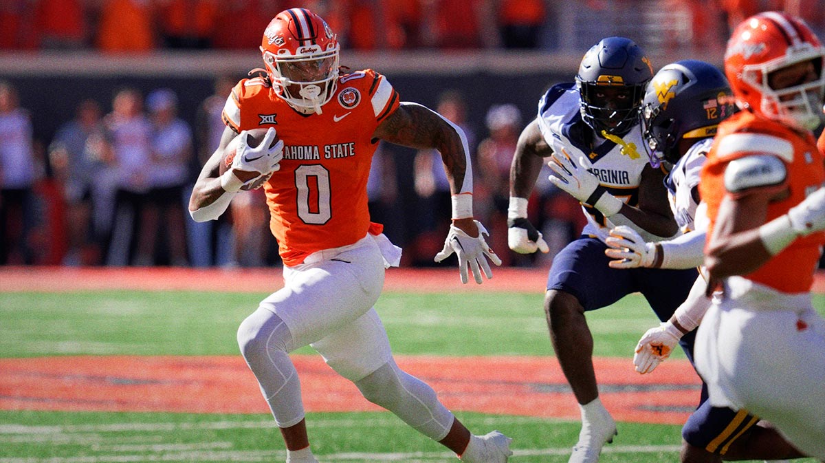 Oklahoma State Cowboys running back Ollie Gordon II (0) carries the ball during a college football game between the Oklahoma State Cowboys (OSU) and the West Virginia Mountaineers at Boone Pickens Stadium in Stillwater, Okla., Saturday, Oct. 5, 2024.