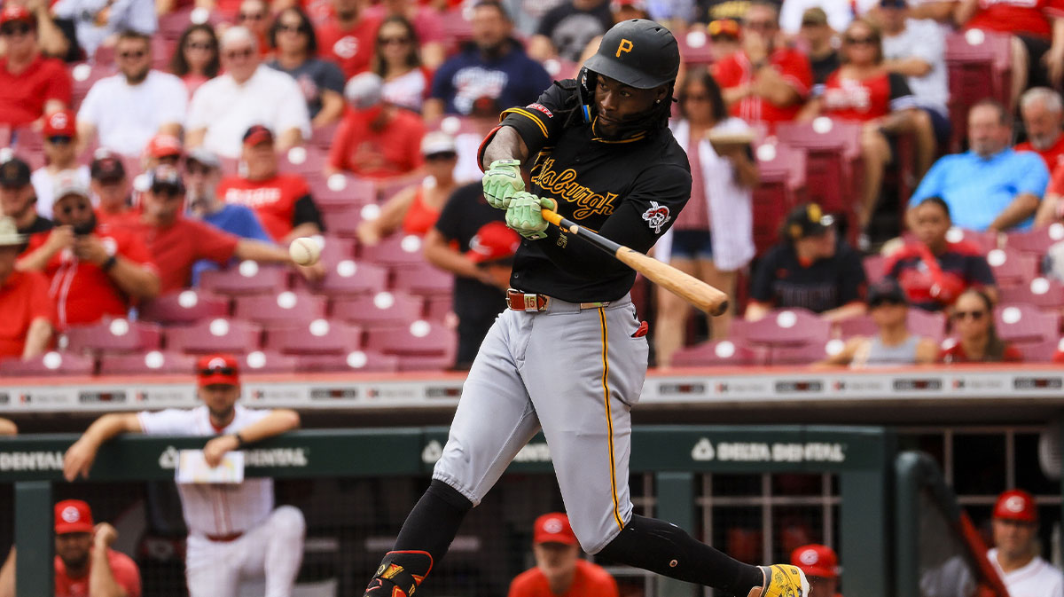 Sep 22, 2024; Cincinnati, Ohio, USA; Pittsburgh Pirates outfielder Oneil Cruz (15) hits a solo home run in the first inning against the Cincinnati Reds at Great American Ball Park. 