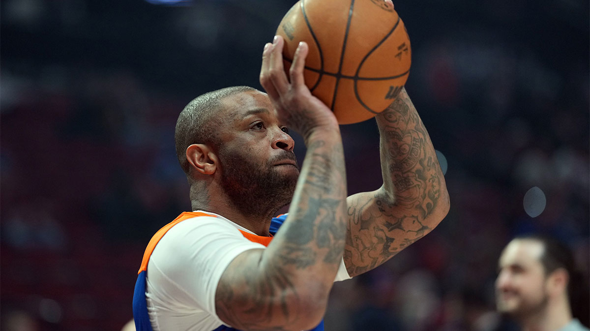 New York Knicks power forward P.J. Tucker (17) warms up before the game against the Portland Trail Blazers at Moda Center. 