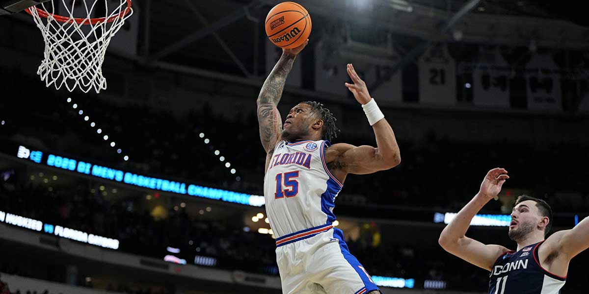 Florida Gators guard Alijah Martin (15) dunks the ball during the second half against the Connecticut Huskies in the second round of the NCAA Tournament at Lenovo Center.