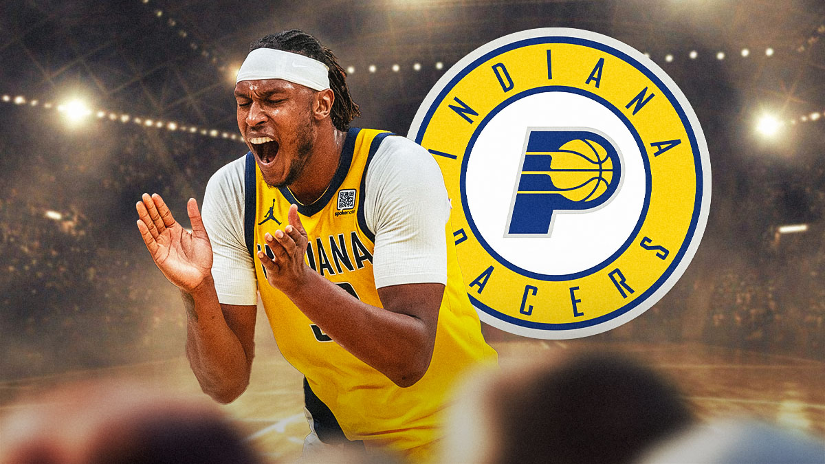 Myles Turner Pacers logo behind him