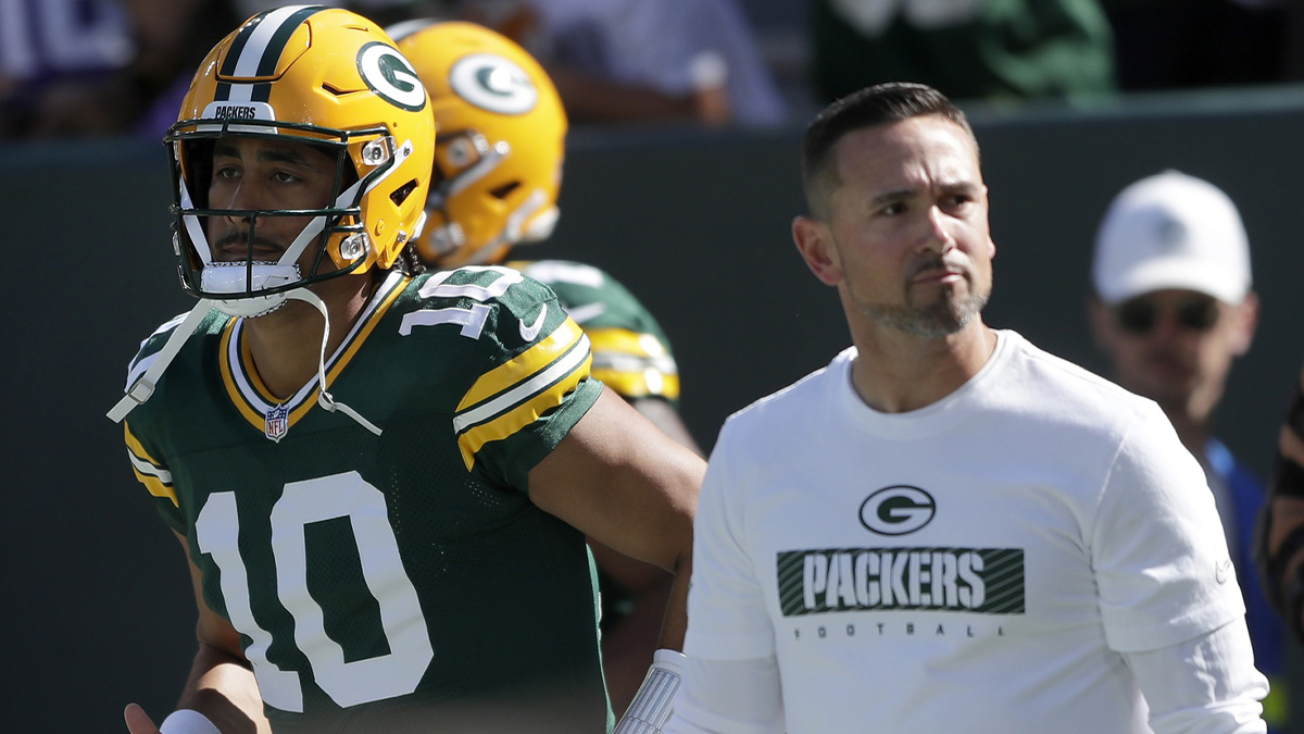 Green Bay Packers quarterback Jordan Love (10) and head coach Matt LaFleur walk onto the field before the game against the Minnesota Vikings at Lambeau Field.William Glasheen/USA TODAY Network via Imagn Images