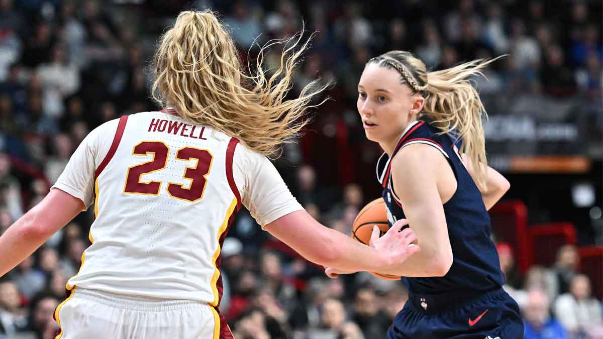 UConn Huskies guard Paige Bueckers (5) controls the ball against USC Trojans guard Avery Howell (23) during the second half of a Elite 8 NCAA Tournament basketball game at Spokane Arena.