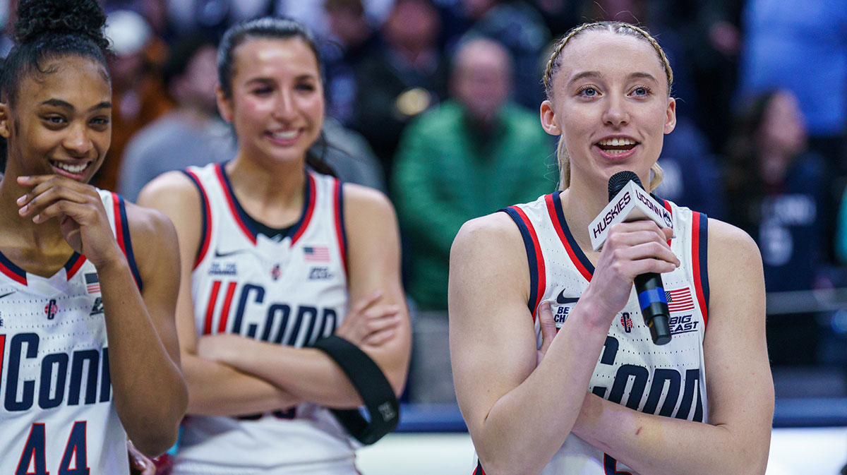 UConn Huskies guard Paige Bueckers (5) talks to the fans during senior night after the game against the Marquette Golden Eagles at Harry A. Gampel Pavilion.