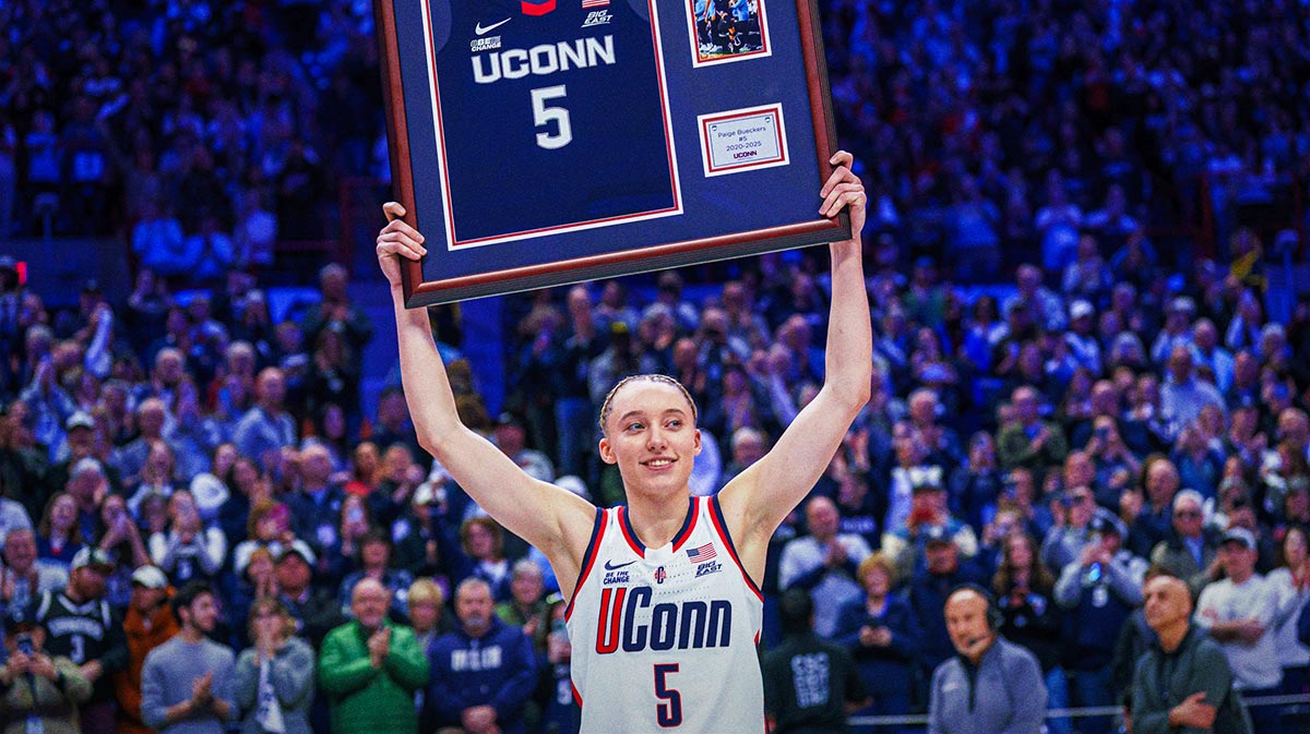 UConn Huskies guard Paige Bueckers (5) is recognized during senior night after the game against the Marquette Golden Eagles at Harry A. Gampel Pavilion.