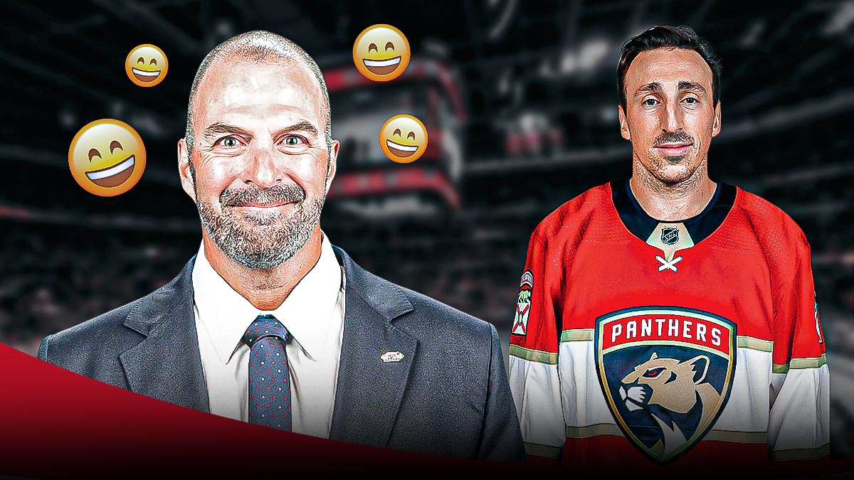 Happy Panthers GM Bill Zito with Brad Marchand
