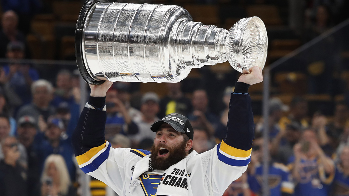 St. Louis Blues left wing Pat Maroon (7) hoists the Stanley Cup after defeating the Boston Bruins in game seven of the 2019 Stanley Cup Final at TD Garden.