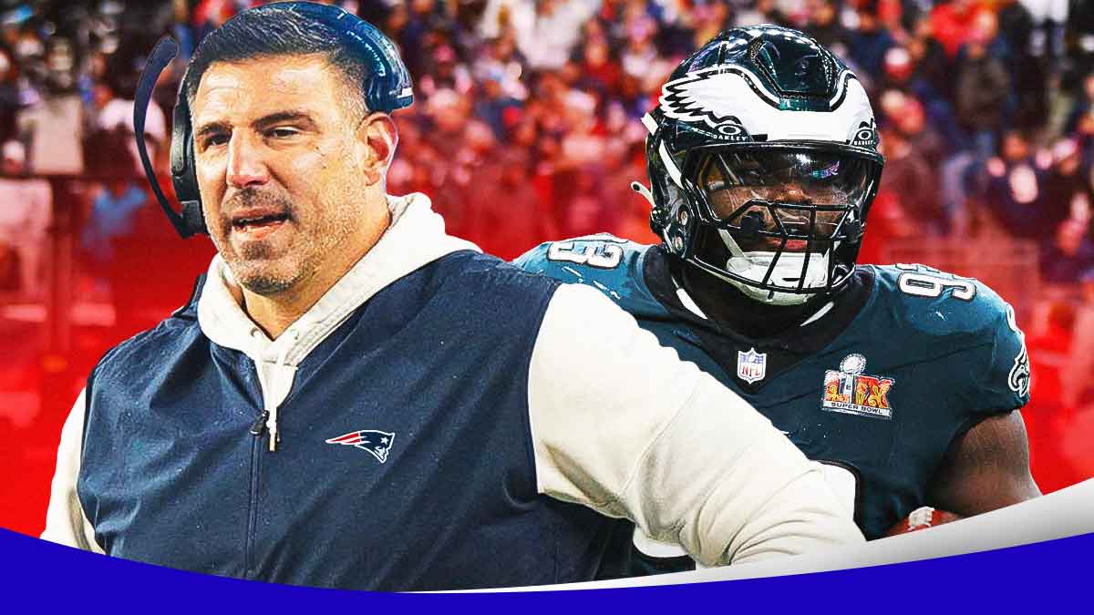 Mike Vrabel next to Milton Williams in front of the Patriots stadium.