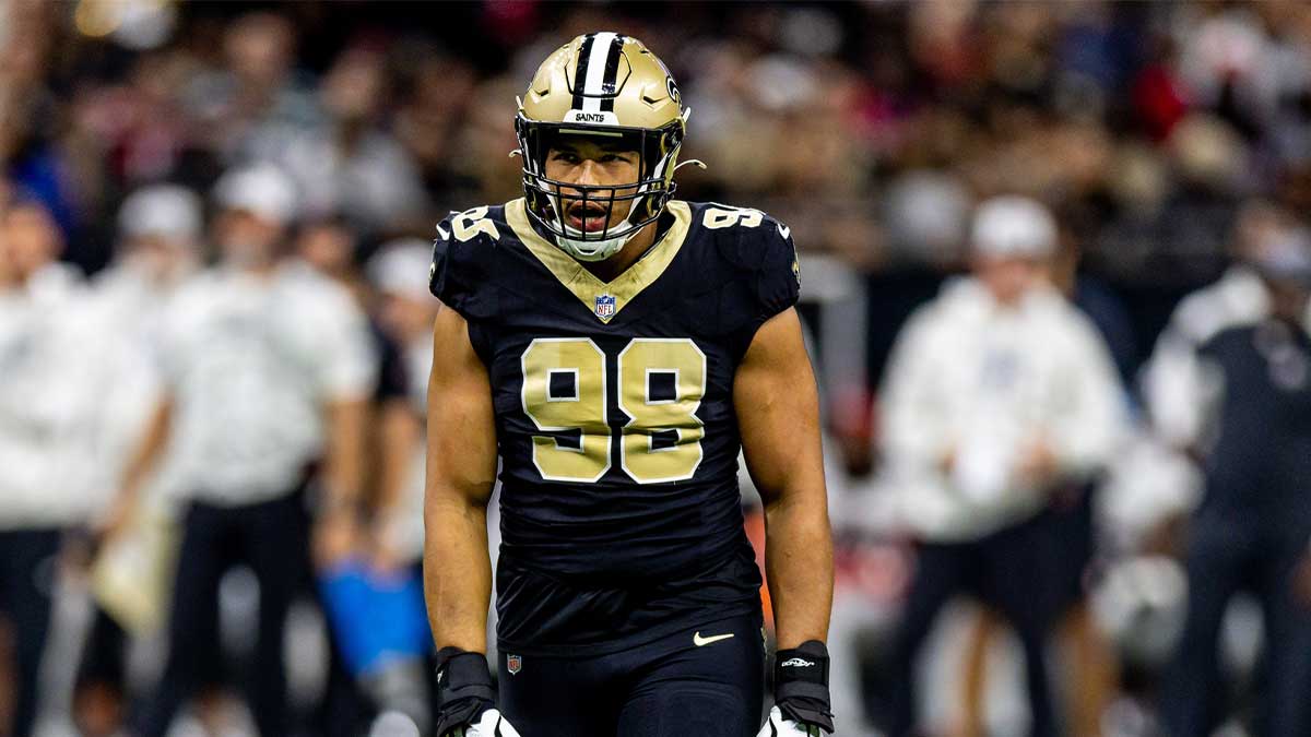 New Orleans Saints defensive end Payton Turner (98) reacts to sacking Atlanta Falcons quarterback Kirk Cousins (18) during the first half at Caesars Superdome.