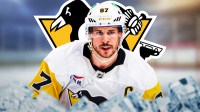Sidney Crosby Penguins logo behind him.