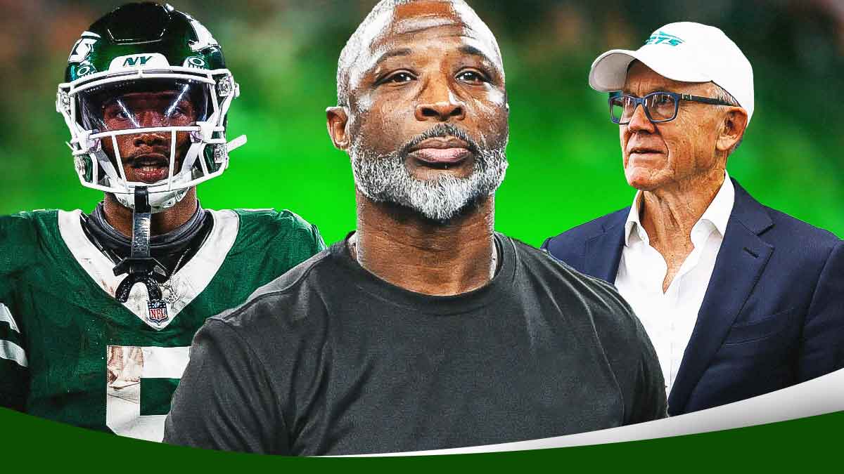 Garrett Wilson, coach Aaron Glenn, GM Darren Mougey all beside each other, New York Jets wallpaper in the background