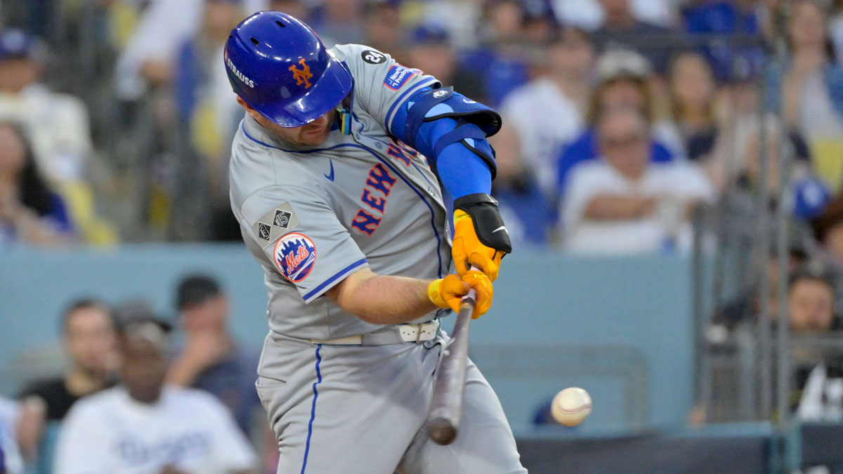 Oct 20, 2024; Los Angeles, California, USA; New York Mets first baseman Pete Alonso (20) hits a single in the third inning against the Los Angeles Dodgers during game six of the NLCS for the 2024 MLB playoffs at Dodger Stadium.