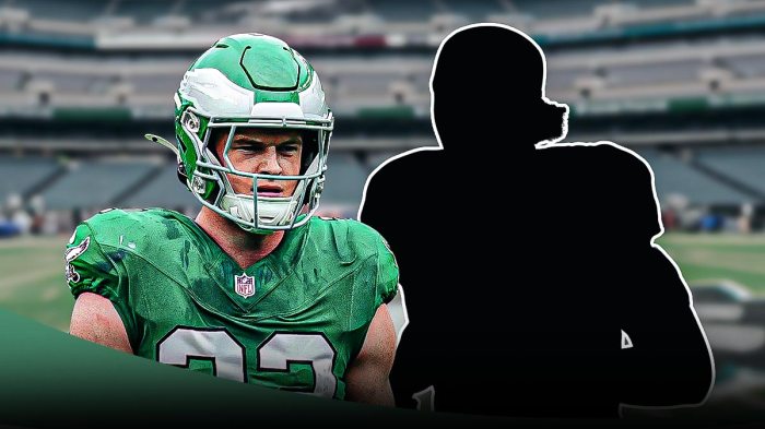 Reed Blankenship next to the blacked-out silhouette of Julian Blackmon on the Eagles field.