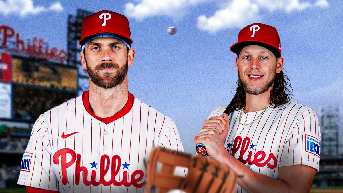 Bryce Harper next to Alec Bohm on the Phillies field.