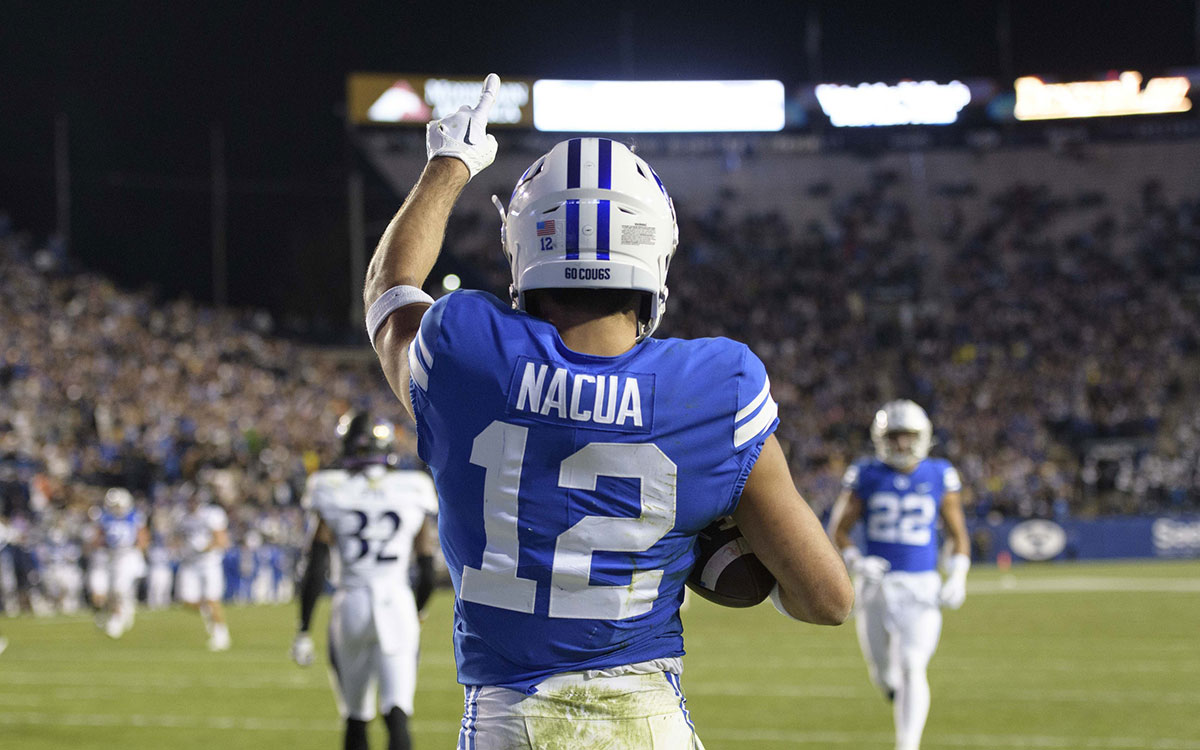 BYU Cougars wide receiver Puka Nacua (12) celebrates after scoring a touchdown during the second quarter against the East Carolina Pirates at LaVell Edwards Stadium.