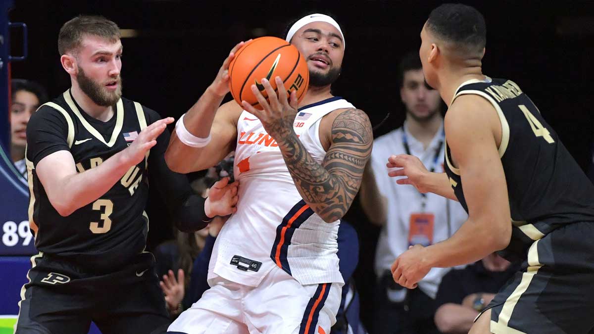 Purdue Boicherakers Guard Braden Smith (3) and Trey Kaufman-Renn (4) The Illinois's pressure fighting Illini Guard Kilan Boswell Boswell (4) during the second half in the State Farm Center.