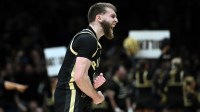Purdue Boilermakers guard Braden Smith (3) reacts against Houston Cougars forward Joseph Tugler (11) in the second half during a Midwest Regional semifinal of the 2025 NCAA tournament at Lucas Oil Stadium.