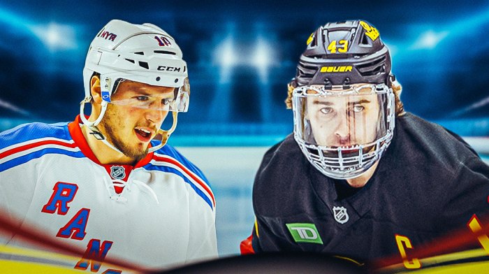 Canucks player Quinn Hughes standing next to JT Miller in a New York Rangers jersey.