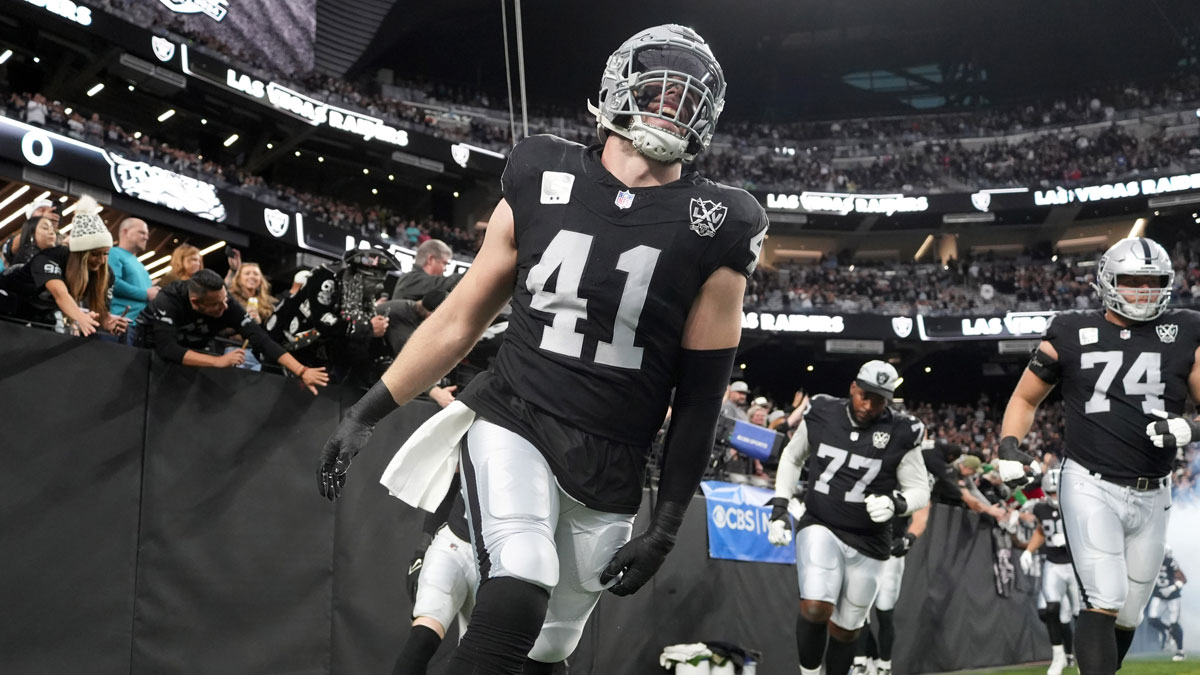 Las Vegas Raiders linebacker Robert Spillane (41) enters the field before the game against the Jacksonville Jaguars at Allegiant Stadium.