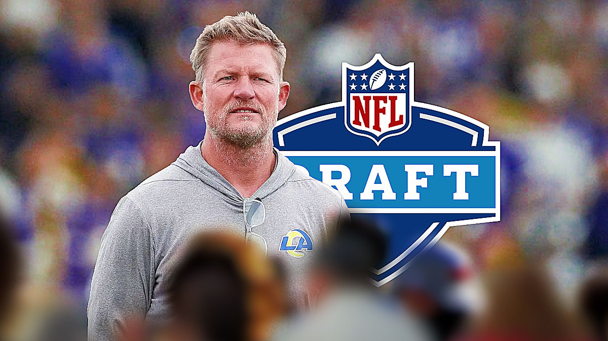 Rams general manager Les Snead with the NFL Draft logo in the background.
