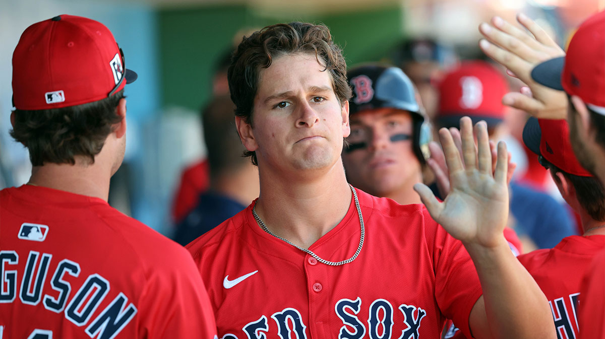 Boston Red Sox outfielder Roman Anthony (48) is congratulated after he scored a run against the Philadelphia Phillies during the third inning at BayCare Ballpark.