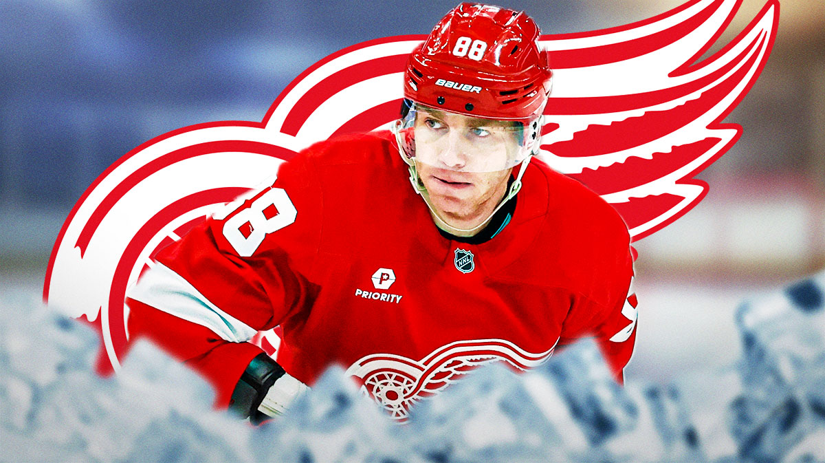 Patrick Kane with fire around him looking happy, Detroit Red Wings logo, hockey rink in background