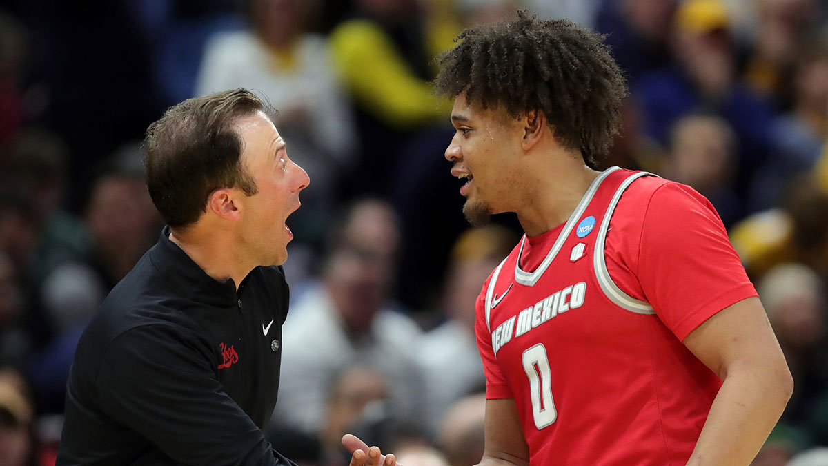 New Mexico Lobos head coach Richard Pitino has a word with guard CJ Noland (0) during the second half of an NCAA Tournament First Round game at Rocket Arena on Friday, March 21, 2025, in Cleveland, Ohio.