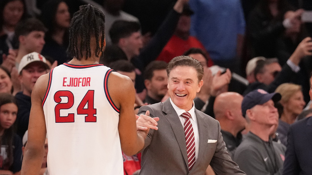 ; St. John's Red Storm forward Zuby Ejiofor (24) is greeted by St. John's Red Storm head coach Rick Pitino as the game ends against the Creighton Bluejays at Madison Square Garden. Mandatory Credit: Robert Deutsch-Imagn Images