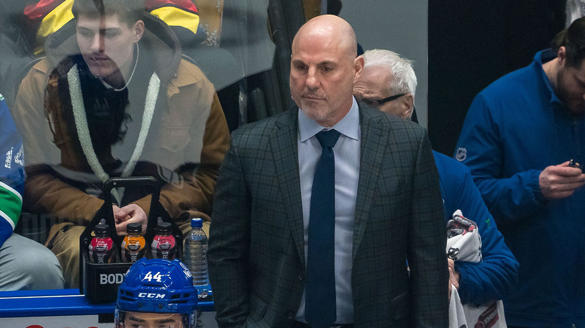 Vancouver Canucks head coach Rick Tocchet on the bench against the Colorado Avalanche in the first period at Rogers Arena