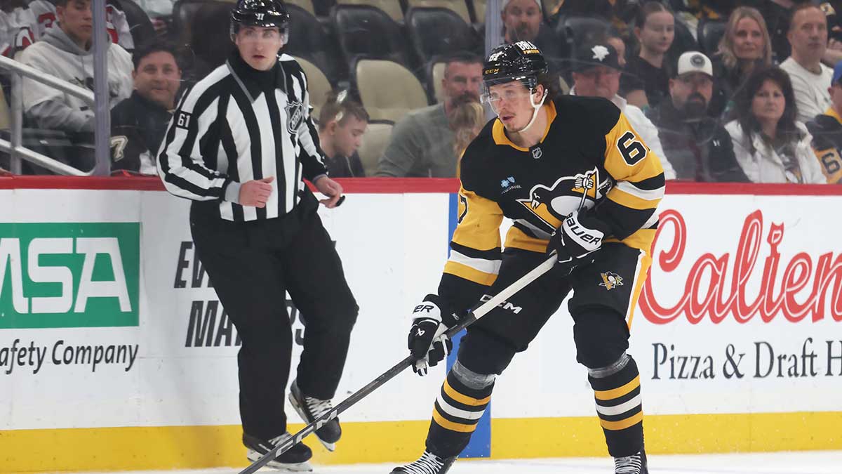 Pittsburgh Penguins right wing Rickard Rakell (67) skates with the puck against the New Jersey Devils during the third period at PPG Paints Arena