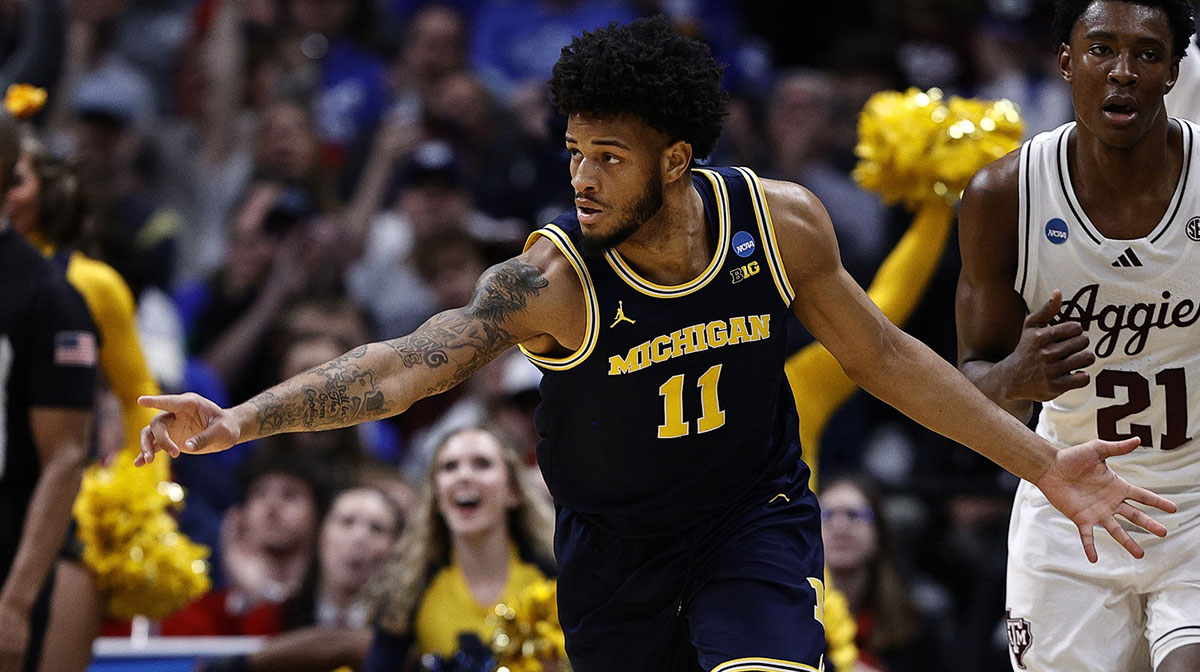 Michigan Wolverines guard Roddy Gayle Jr. (11) reacts against the Texas A&M Aggies during the second half in the second round of the NCAA Tournament at Ball Arena.