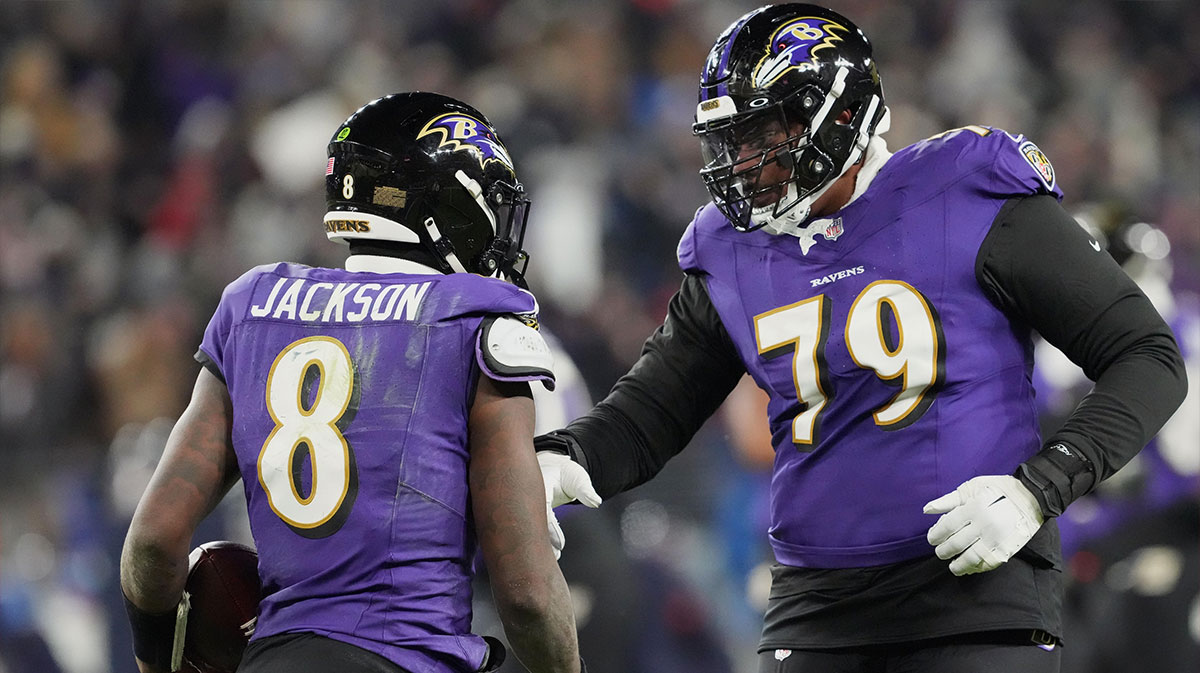 Jan 20, 2024; Baltimore, MD, USA; Baltimore Ravens quarterback Lamar Jackson (8) celebrates with offensive tackle Ronnie Stanley (79) after scoring a touchdown against the Houston Texans during the third quarter of a 2024 AFC divisional round game at M&T Bank Stadium.