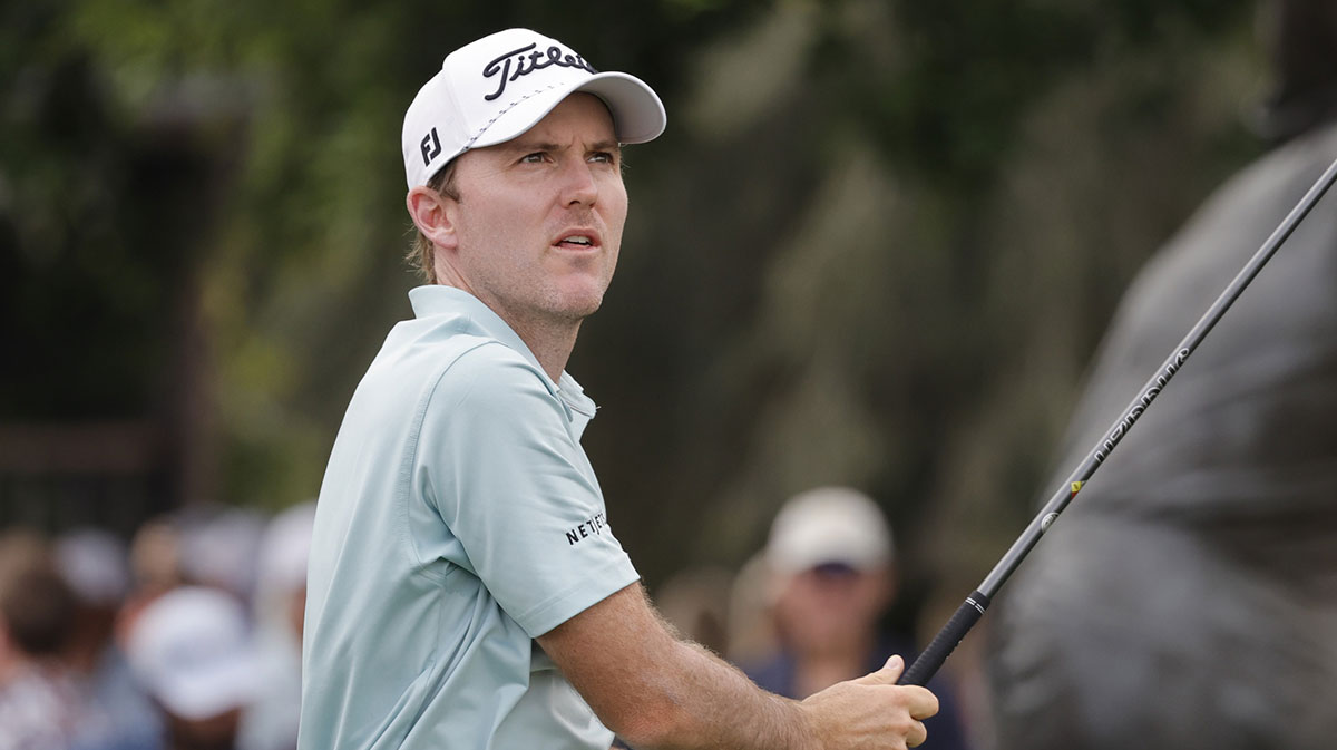 Russell Henley plays his shot from the first tee during the final round of the Arnold Palmer Invitational golf tournament at Bay Hill.