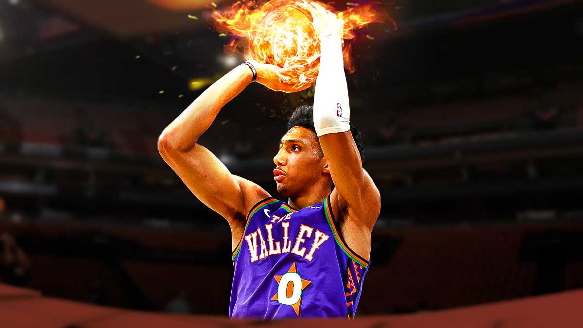 Ryan Dunn shooting a ball of fire in a Phoenix Suns jersey.