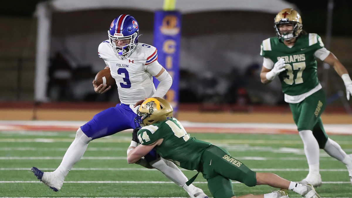 St. Bonaventure's Dylan Dunst tackles Folsom quarterback Ryder Lyons during the fourth quarter of the CIF-State Division 1-A state championship bowl at Saddleback College