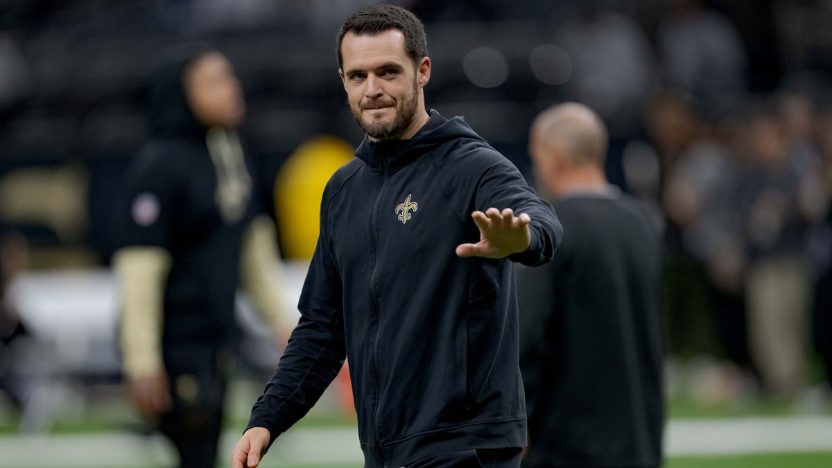 New Orleans Saints quarterback Derek Carr (4) walks the field before a game against the Las Vegas Raiders at Caesars Superdome.