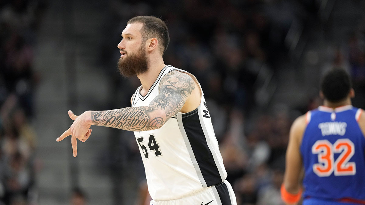 San Antonio Spurs forward Sandro Mamukelashvili (54) reacts after scoring a three point basket during the second half against the New York Knicks at Frost Bank Center.