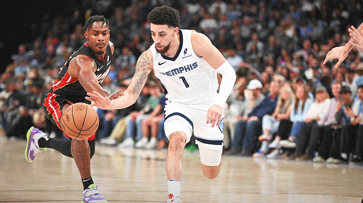 Memphis Grizzlies guard Scotty Pippen Jr. (1) collects the loose ball in the fourth quarter of the game against the Miami Heat at FedExForum.