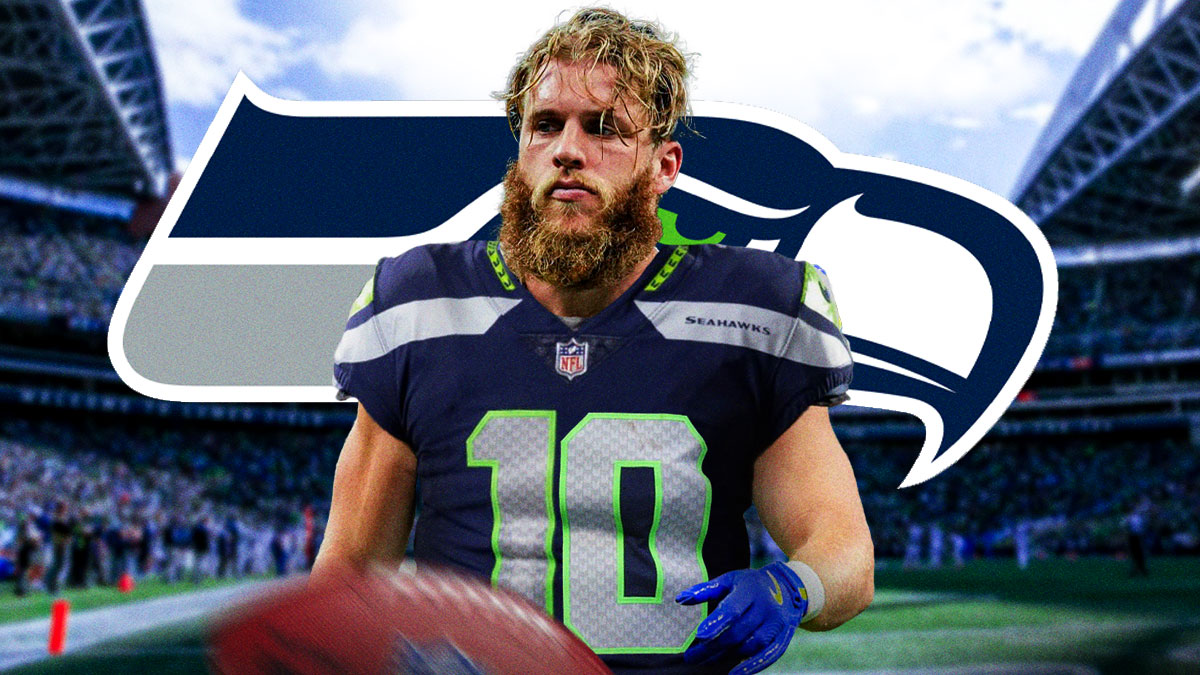 Cooper Kupp (in a Seahawks uniform) looking serious with the Seahawks logo next to him.