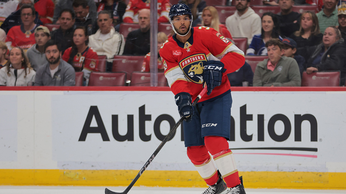 Florida Panthers defenseman Seth Jones (3) moves the puck against the Tampa Bay Lightning during the first period at Amerant Bank Arena.