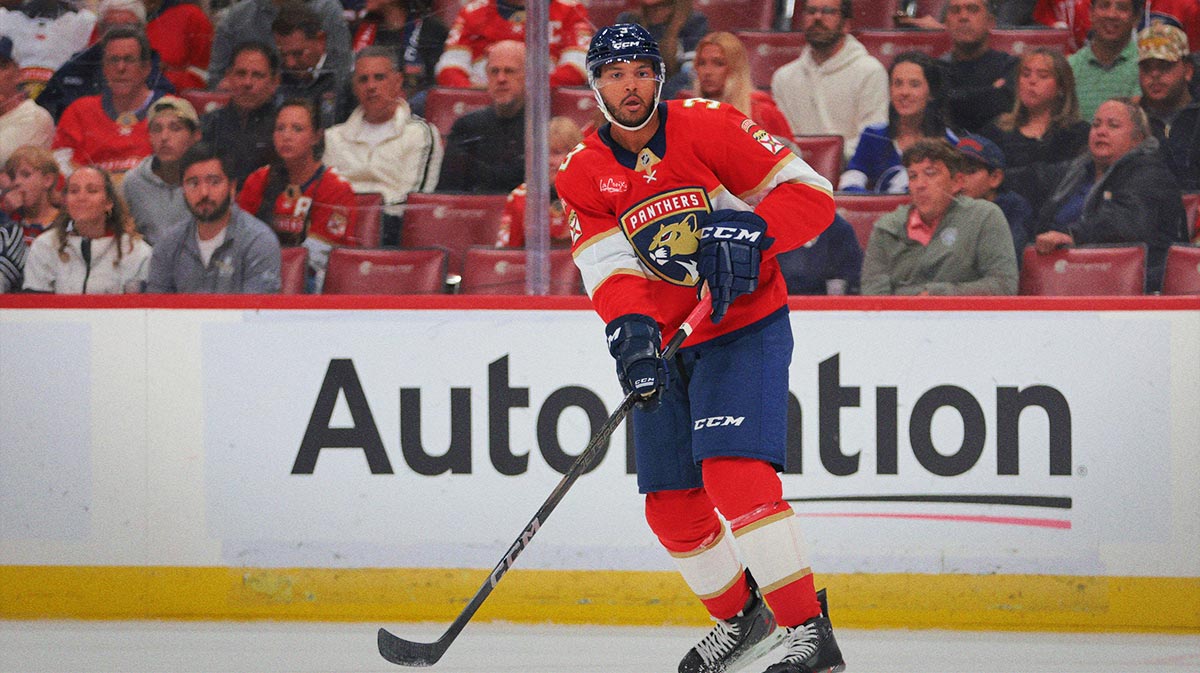 Florida Panthers defenseman Seth Jones (3) moves the puck against the Tampa Bay Lightning during the first period at Amerant Bank Arena.