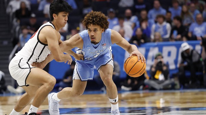 North Carolina Tar Heels guard Seth Trimble (7) dribbles the ball defended by San Diego State Aztecs guard Kimo Ferrari (23) in the second half at UD Arena.