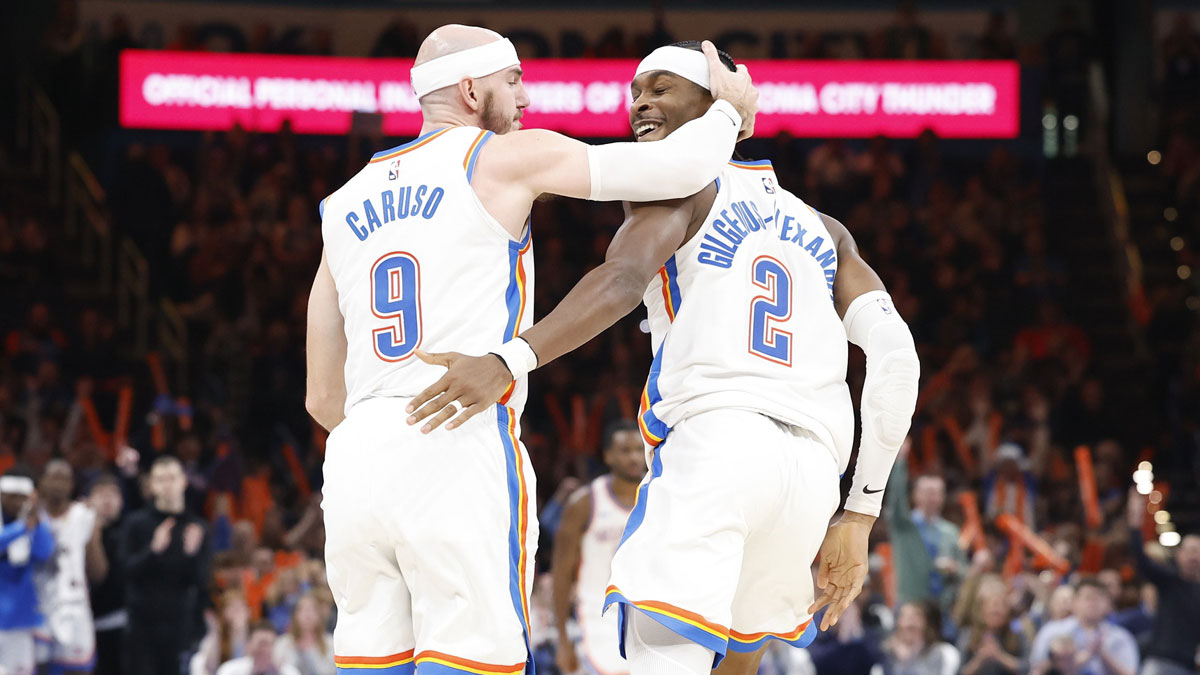 Oklahoma City Thunder guard Alex Caruso (9) and guard Shai Gilgeous-Alexander (2) celebrate after a play against the Washington Wizards during the second half at Paycom Center.