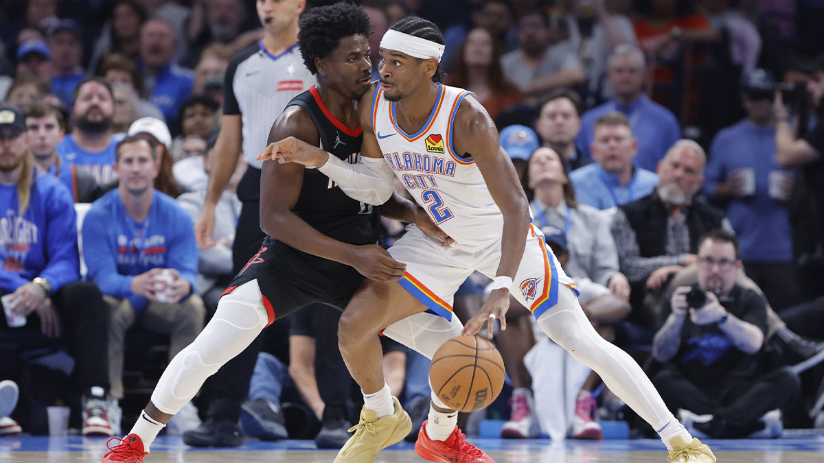 Oklahoma City Thunder Guard Shai Gilgeous-Alexander (2) Vehicles against Houston Rocket Guard Aaron Holiday (0) during the second half in Center Paicom. Mandatory Credit: Alonzo Adams-IMSN Pictures