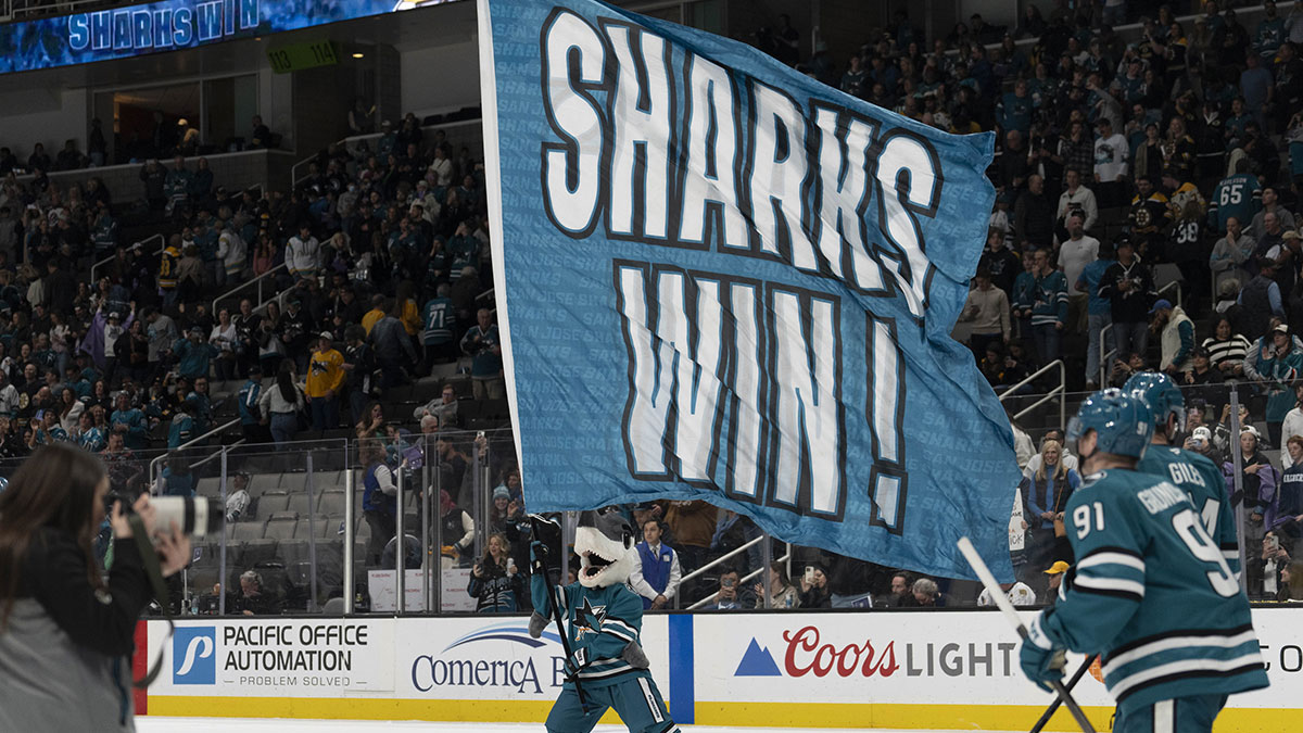 San Jose Sharks mascot SJ Sharkie waves a flag after the team defeated the Boston Bruins at SAP Center at San Jose.