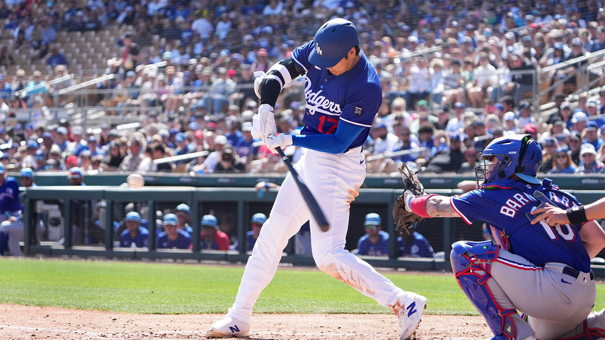 Los Angeles Dodgers two-way player Shohei Ohtani (17) bats against the Texas Rangers during the third inning at Camelback Ranch-Glendale. Mandatory Credit: Joe Camporeale-Imagn Images