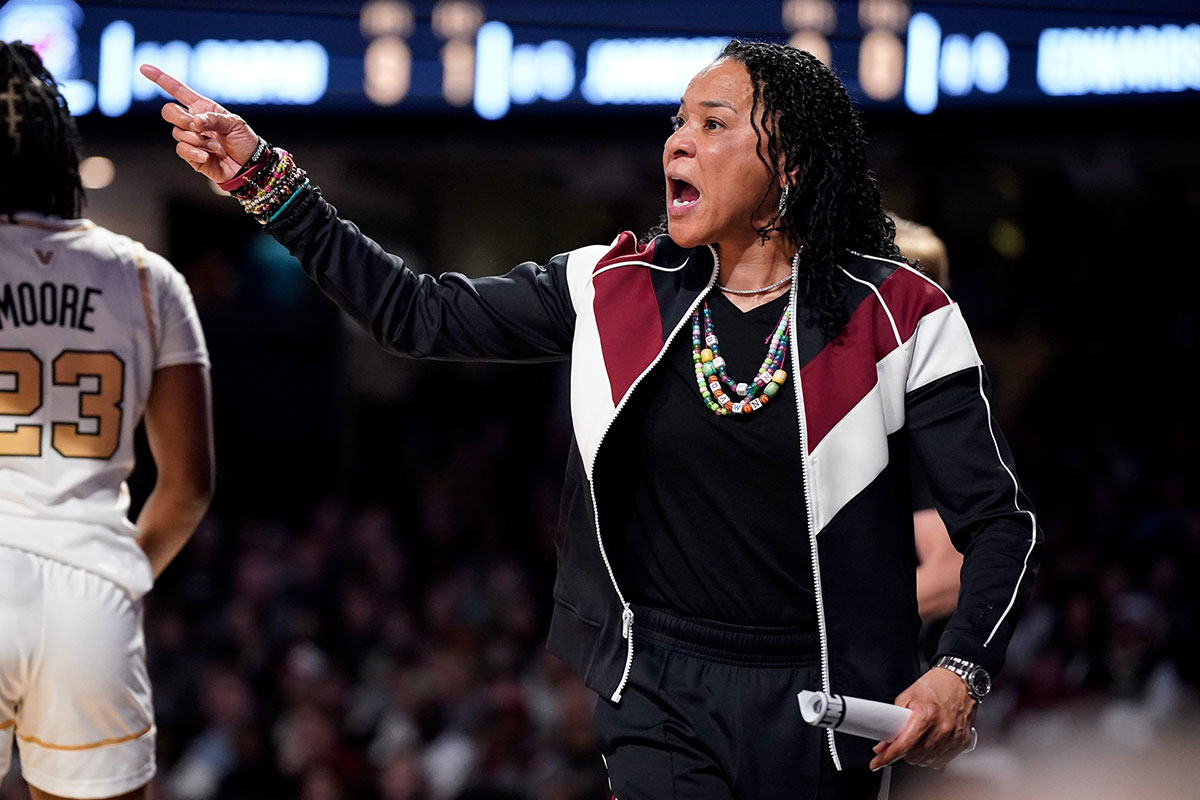 South Carolina head coach Dawn Staley works with her team against the Vanderbilt during the second quarter.