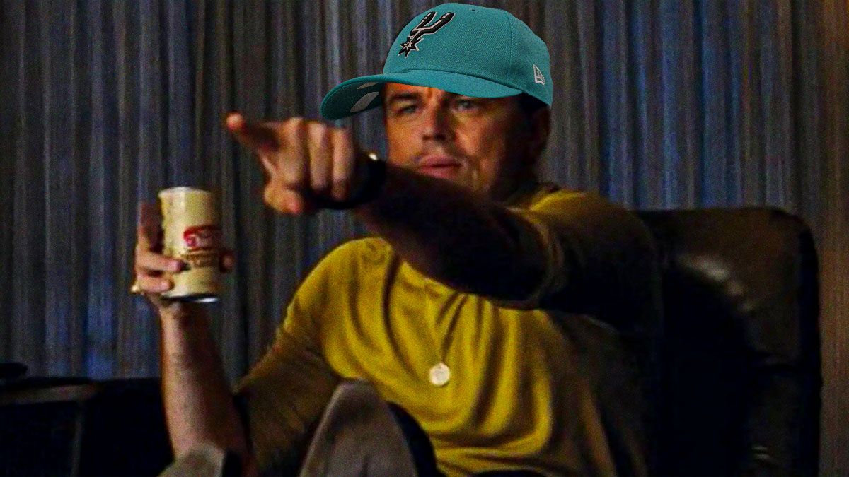 The Leonardo Dicaprio pointing meme but add a San Antonio Spurs cap on him.