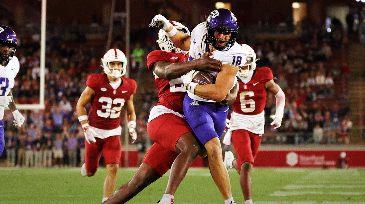 CU Horned Frogs wide receiver Jack Bech (18) is tackled by Stanford Cardinal linebacker David Bailey (23) during the second half at Stanford Stadium.